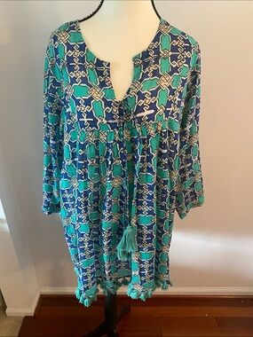 RO’S Garden medium resort wear dress. Tassel details